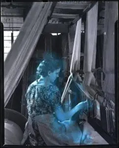 A-woman-at-work-at-the-Dickey-cotton-mill-in-Oella-Maryland.